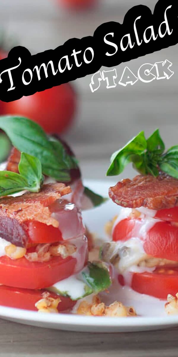 This tomato salad stack is beautiful and tasty. A gorgeous tomato salad with a stack of sliced and flavorful ingredients in each layer. Corn, bacon, dressing and basil make this a summer salad you don't want to miss. Add avocado for even more tasty flavors.