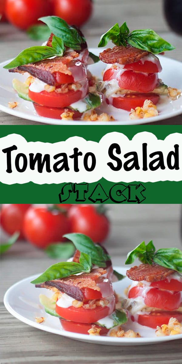 This tomato salad stack is beautiful and tasty. A gorgeous tomato salad with a stack of sliced and flavorful ingredients in each layer. Corn, bacon, dressing and basil make this a summer salad you don't want to miss. Add avocado for even more tasty flavors.
