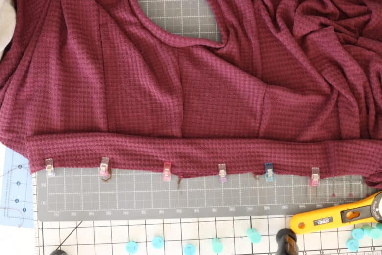 fold sleeve in half and clip and sew to shoulder