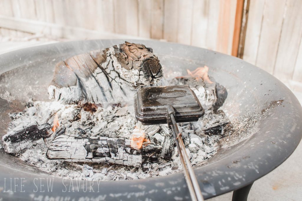 campfire pie make on fire pit in backyard