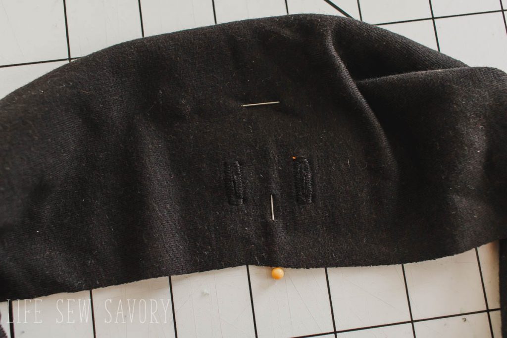 add button holes to the waistband for the ties