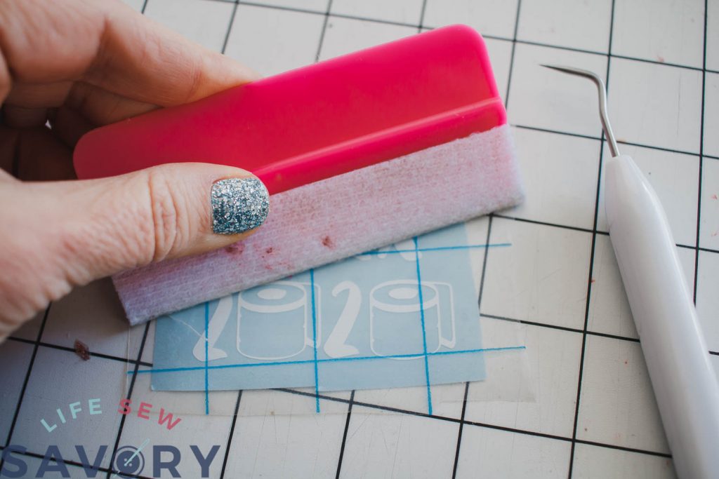 use transfer tape for the DIY vinyl ornaments