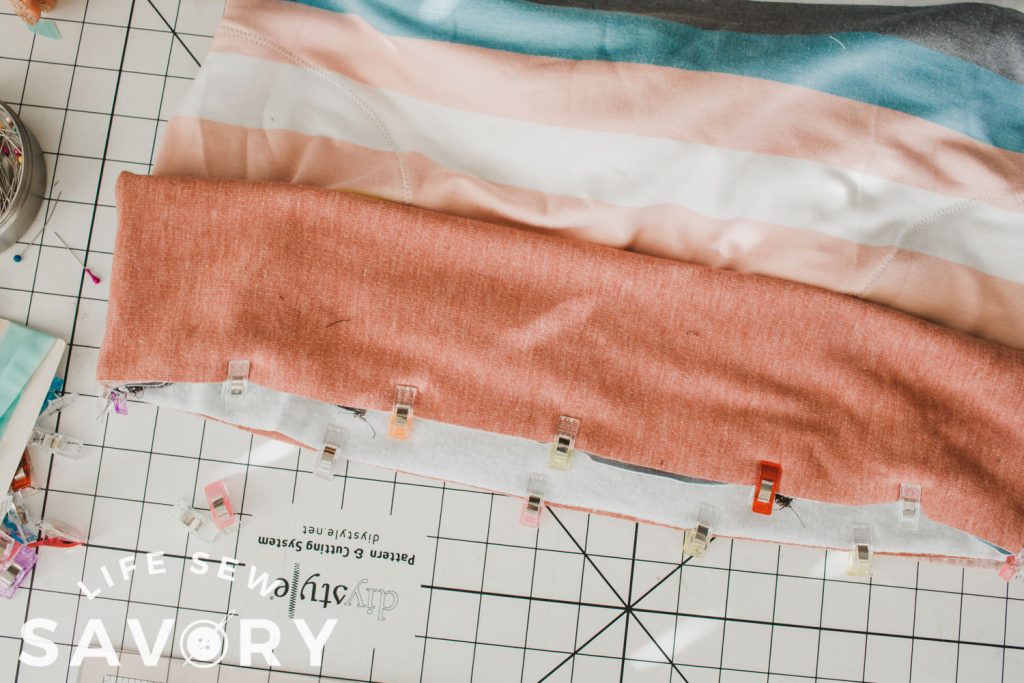 clip band to bottom of shirt