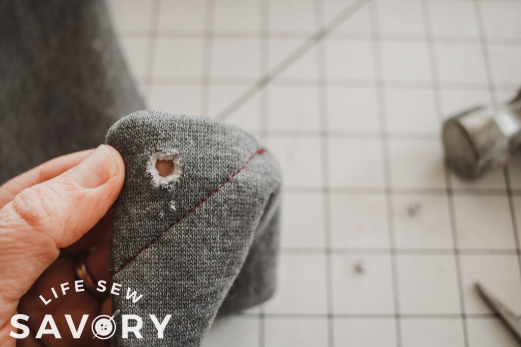 cut a tiny hole in the middle