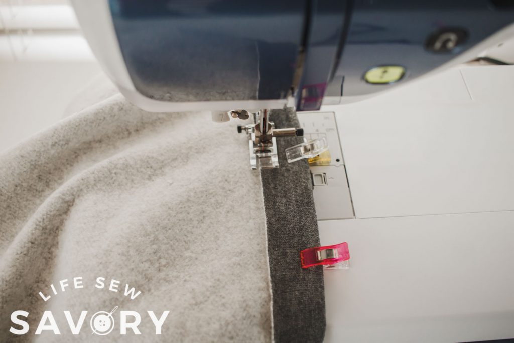 Sew a 1" hem at the top