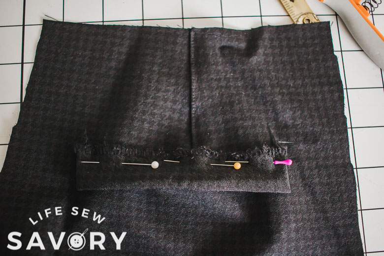 pin faux pocket at bottom of dart