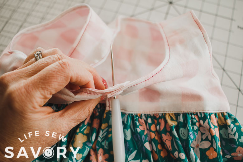 line up front edges and add snaps or buttons