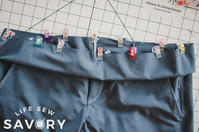 fold waistband and pin to top of shorts