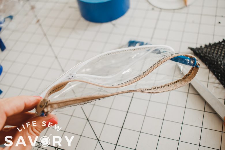 finish sides of pouch with tape or bias tape