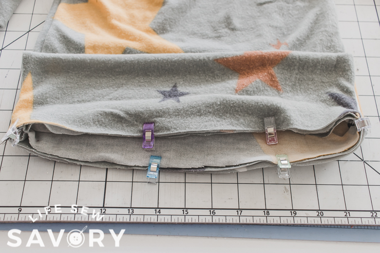 pin/clip onto bottom of shirt