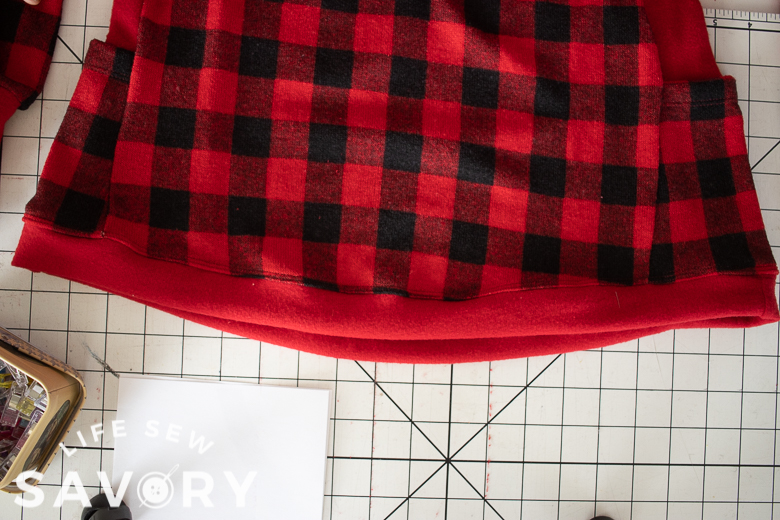 sew band on bottom of top or hem