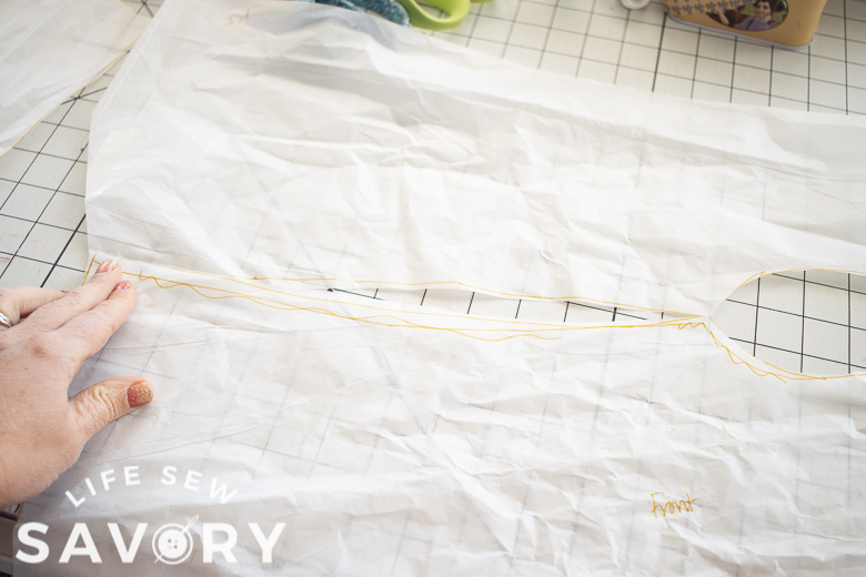 Lay front and back together at sides