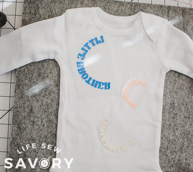 layout design on onesie before ironing