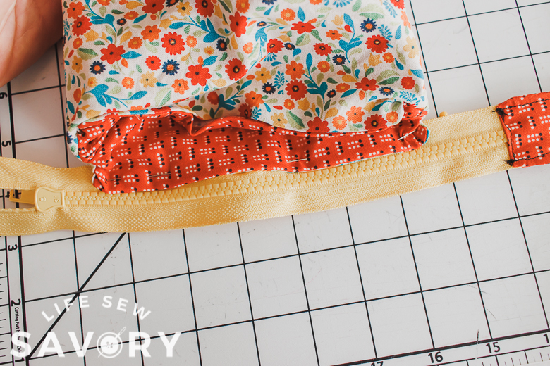 sew zipper to one side of bag top