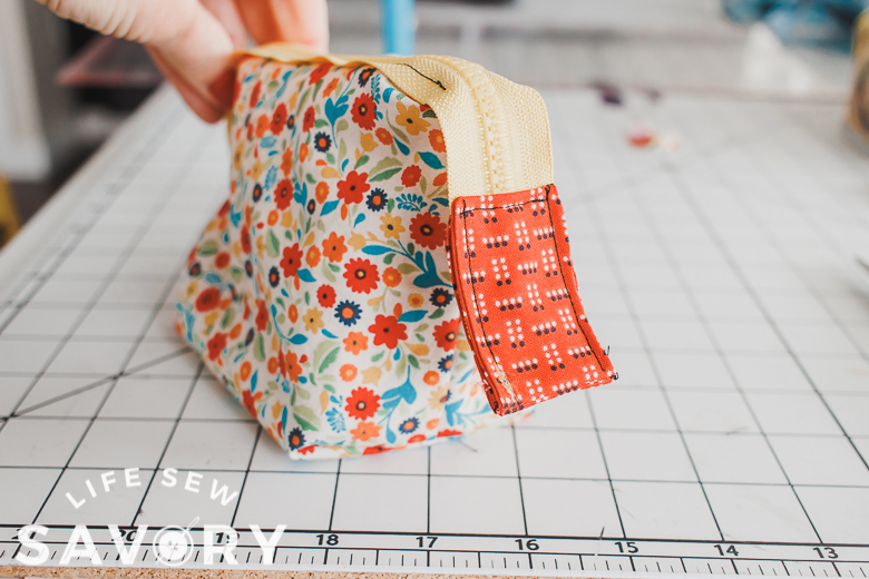 exposed zipper pouch