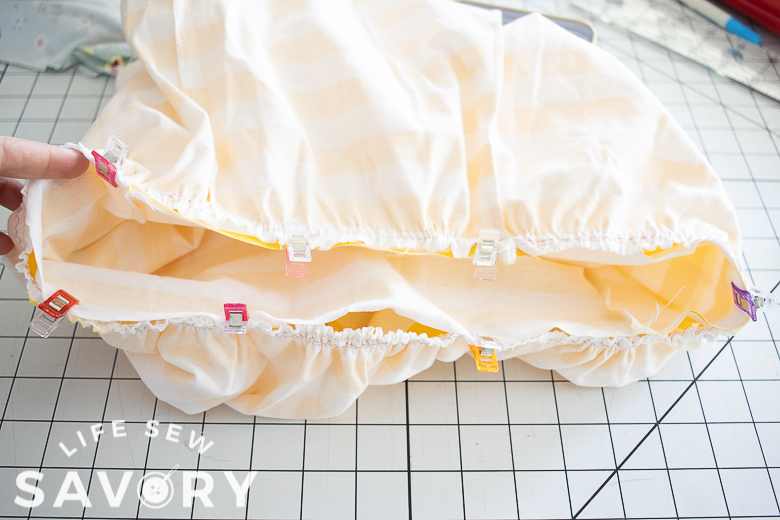 with right sides together, pin skirt and top together