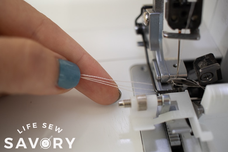 three threads in back of machine