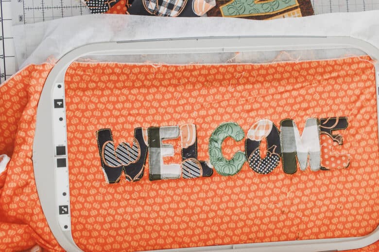 applique letters on welcome sign