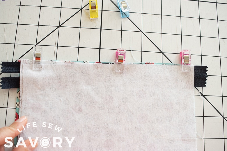 fabric right sides together with zipper in the middle