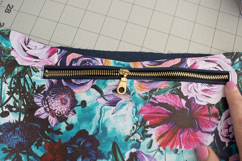 sew around zipper to secure