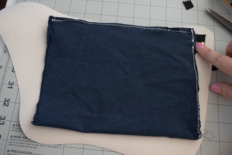 use serger or zig zag to sew around the pocket.