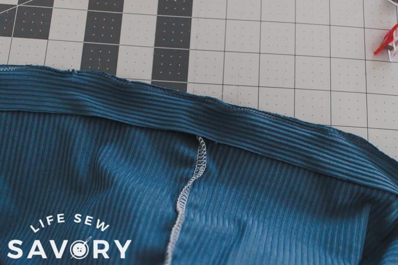 sew binding piece to back side of fabric