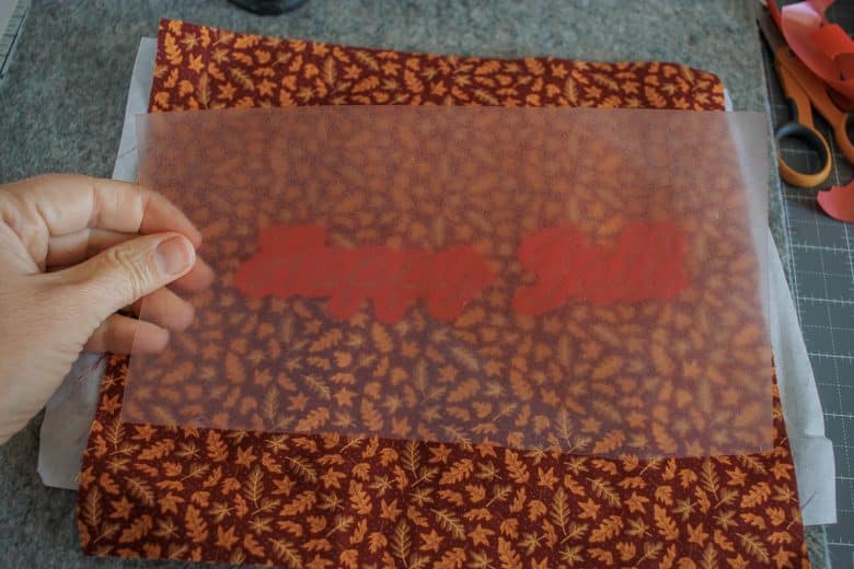 place protective plastic on top and press