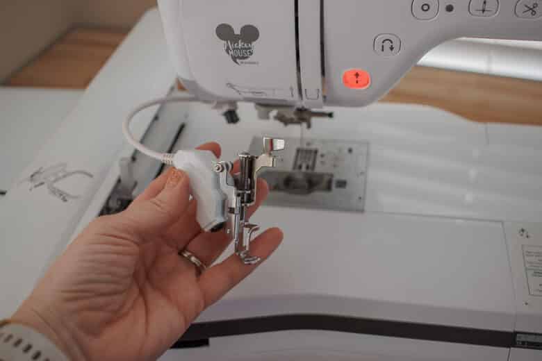 place embroidery foot on machine