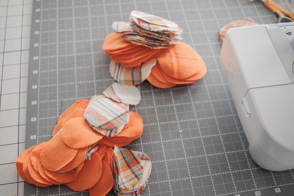 cut a whole bunch of round fabric pieces