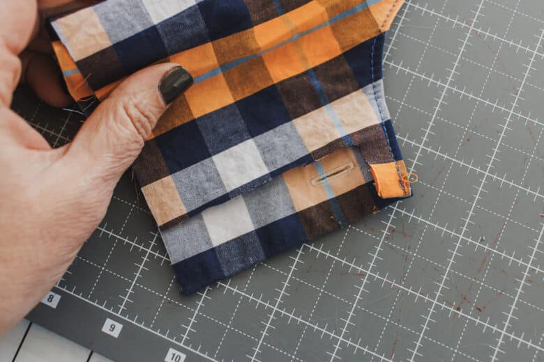 exposed button hole