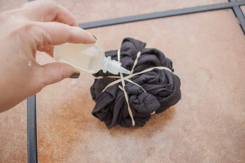 place bleach in the folds. I used a full small bottle of bleach