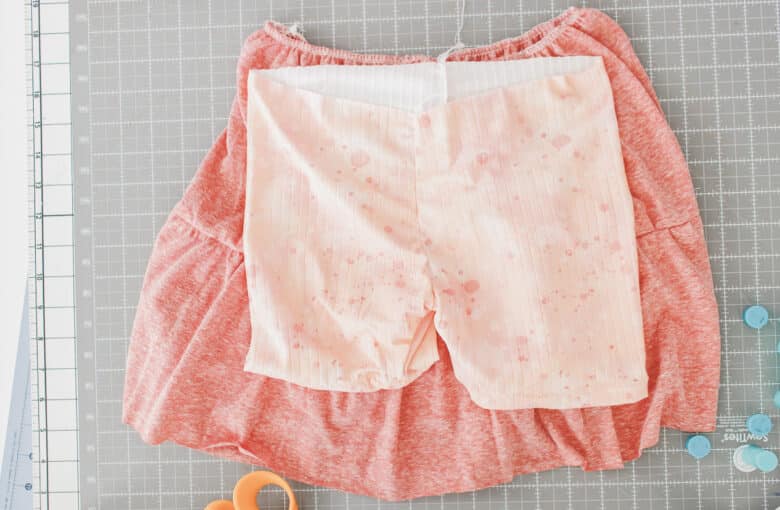 place shorts inside skirt