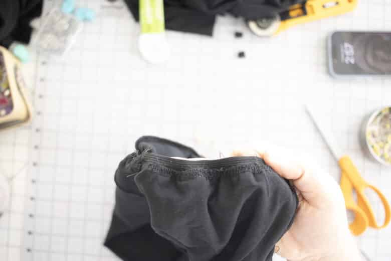 sew elastic on top edge of seam. It should be sticking up off the top