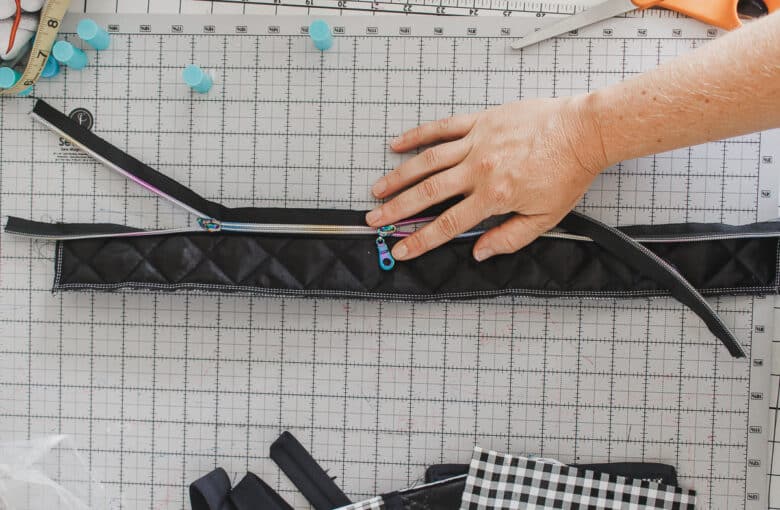 sew zipper to zipper facing