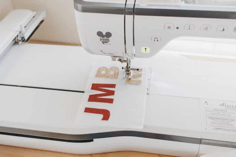 sew letters onto felt
