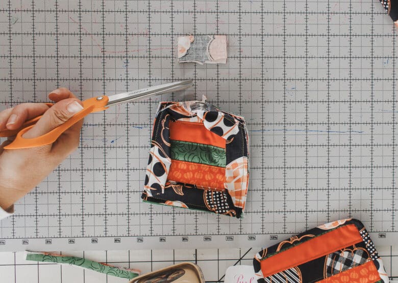 trim extra fabric to finish binding