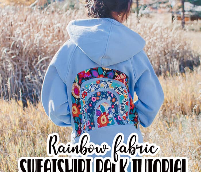 learn how to make a DIY rainbow sweatshirt. Add a fun rainbow fabric design to the back of of a sweatshirt with this fun sweatshirt sewing hack.