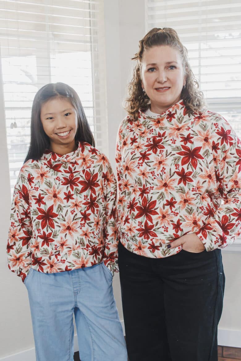 Find the details for the fabric and pattern used to create matching Christmas shirts for mom and daughter. The Surge Sweatshirt pattern is perfect for this project. I love sewing patterns that work for matching outfits.