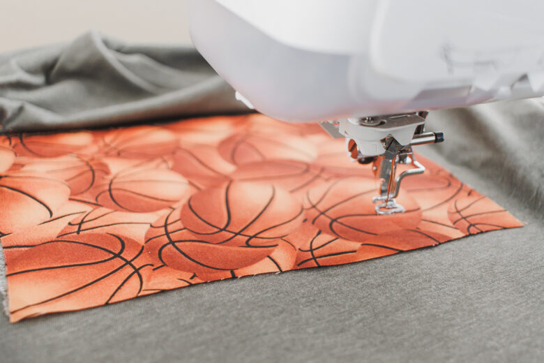 place fabric over placement stitches