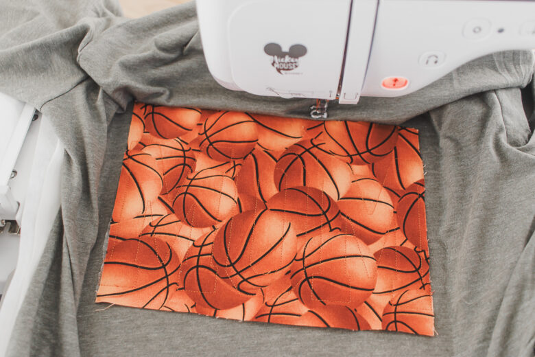 tack down fabric and stitch out designs