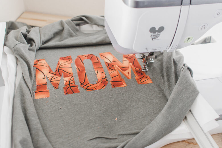 learn how to make this fun Basketball mom shirt with applique. Cute applique project to make for basketball season with your embroidery machine. Supplies and tutorial.