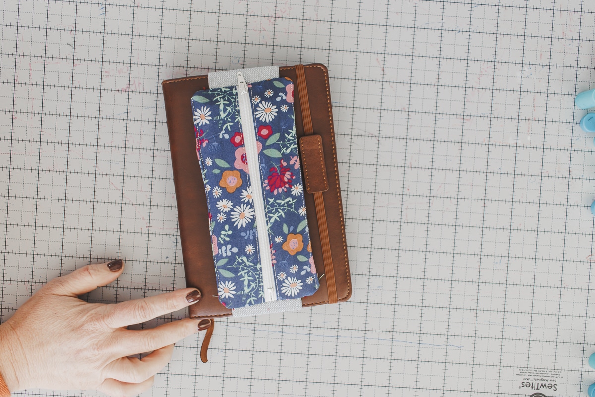 Zippered pen holder for journals and notebooks