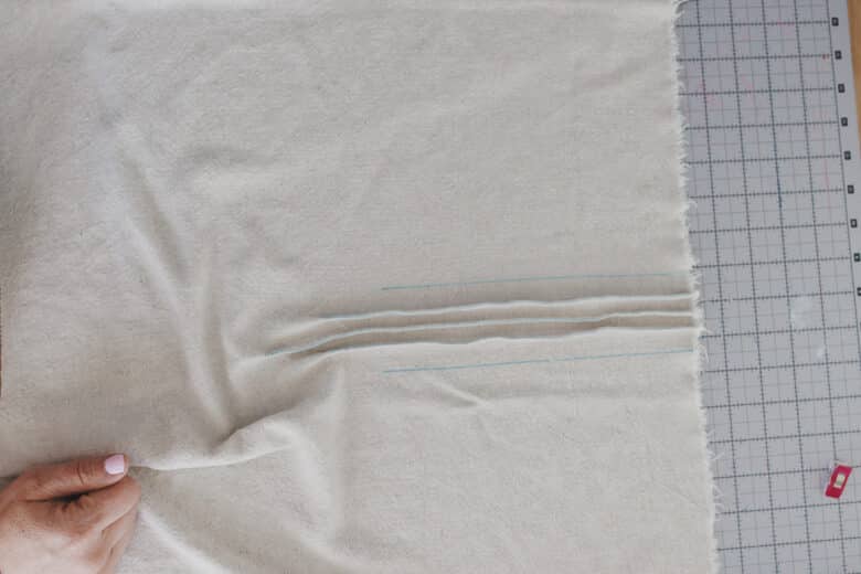 cut out front with pleats
