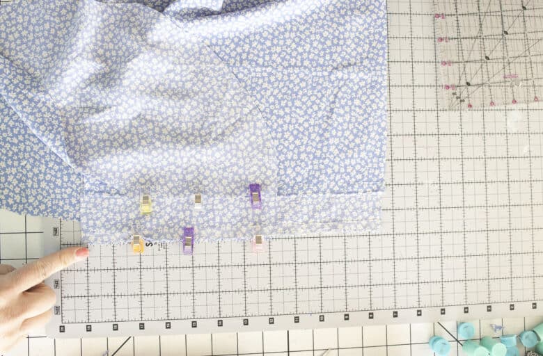 sew pockets to bottom of first tier