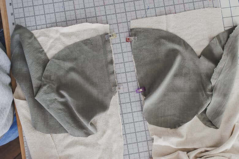 place pockets on each side of front 1" down