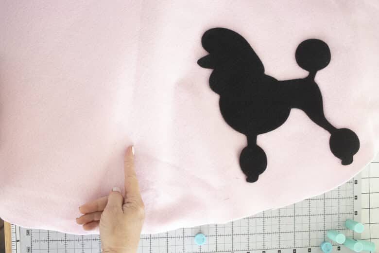place to side of center on skirt