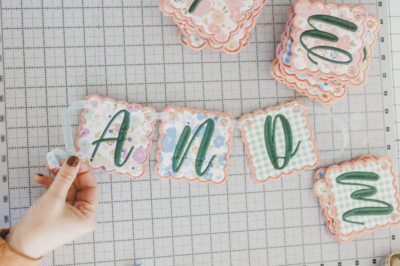 leave a bit of ribbon between each letter