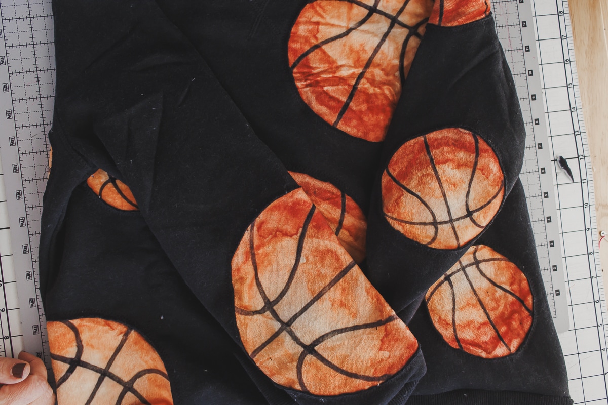 sew basketballs into a sweatshirt - reverse applique technique